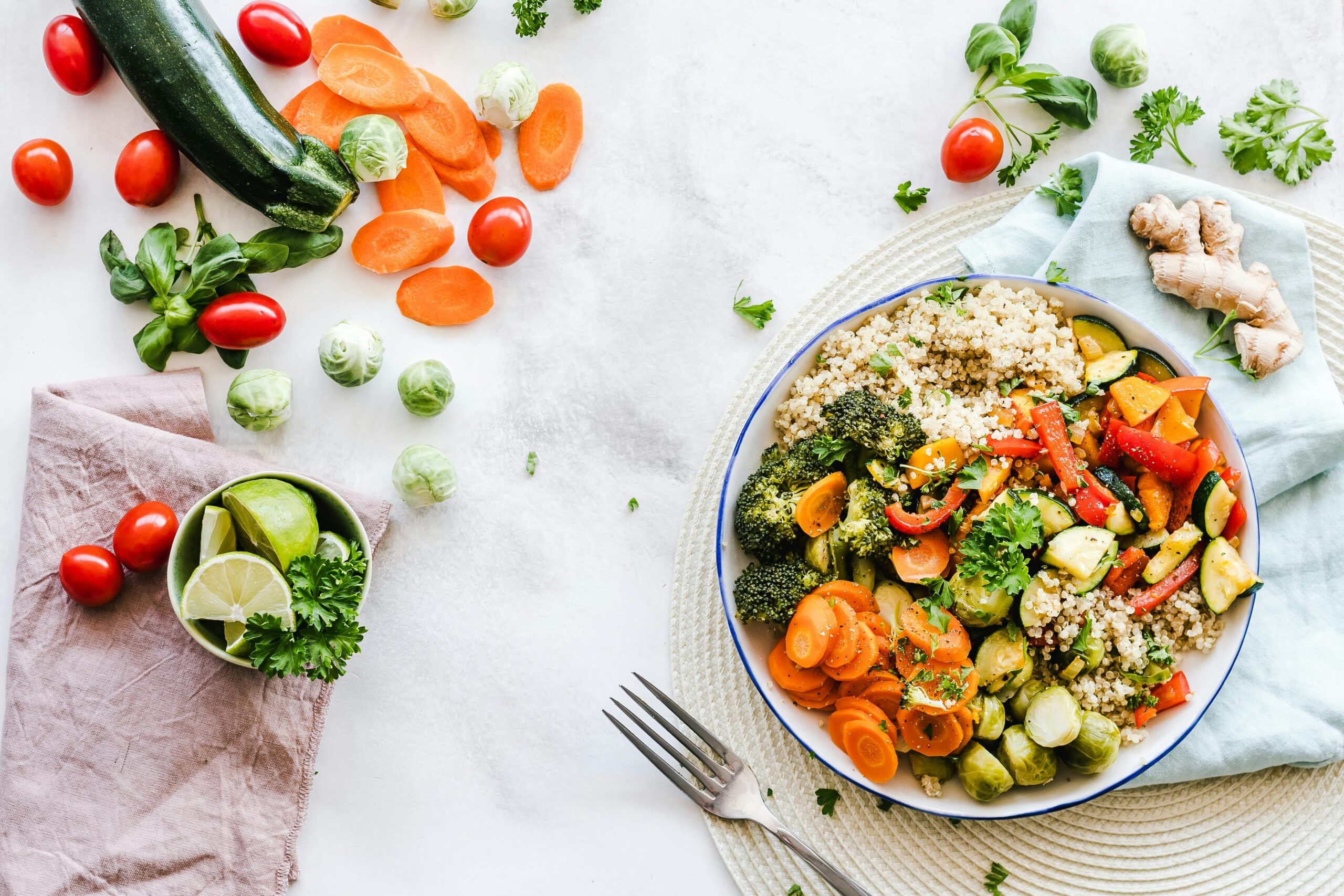 A bowl with sliced avocado and two fried eggs, drizzled with olive oil, a simple keto-friendly diet