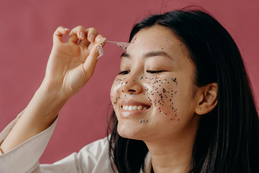 Woman Applying Skincare Products